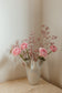 FLORAL DECORATION IN A DRAPPO BLANCO VASE