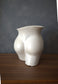 FLORAL DECORATION IN BOOTY VASE